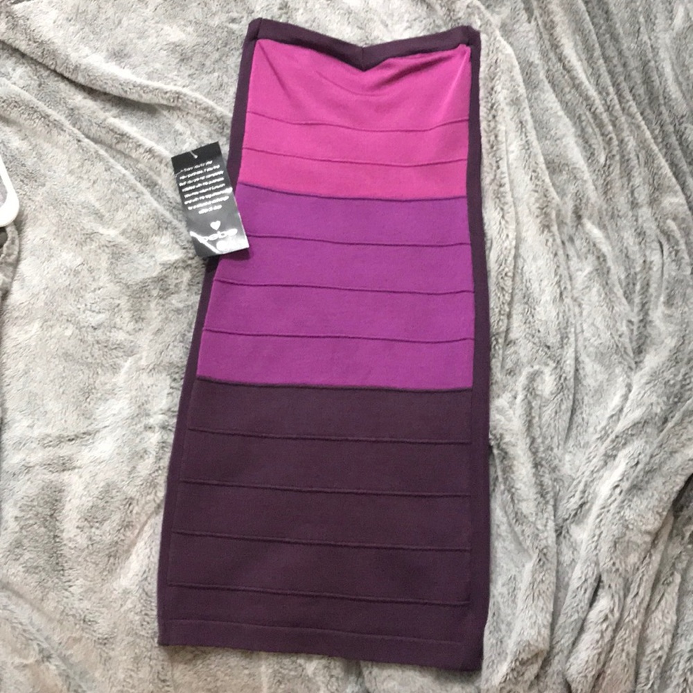 NWT Bebe strapless bodycon. New with tag